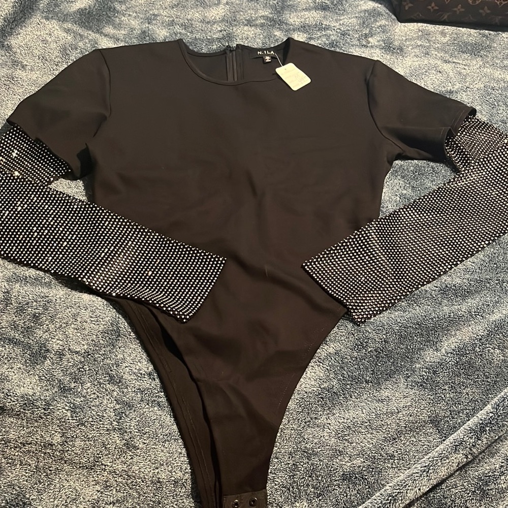 Not your average body suit! We love details!!!!!!